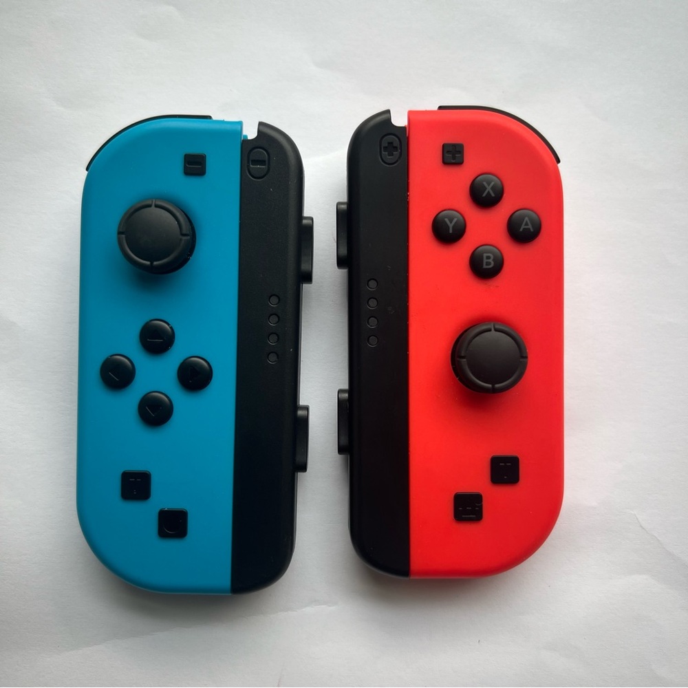 Nintendo Joy-Con Controller - Neon Blue/Neon Red With Joy Con Grip unbranded
